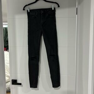 AMERICAN EAGLE next level stretch high rise skinny jeans with rips on both knees